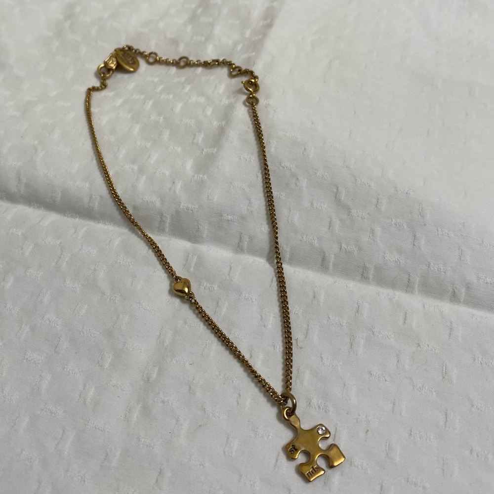 Juicy Couture Puzzle Piece Necklace